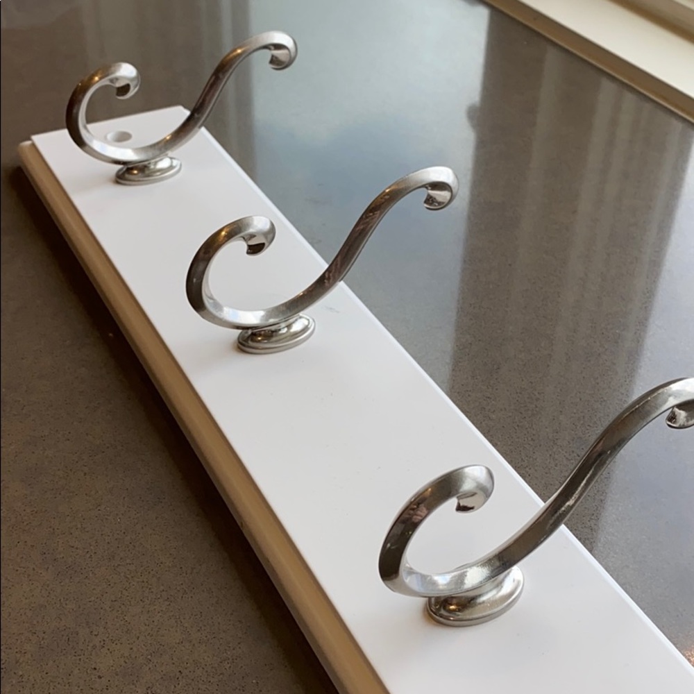 White and silver wall hooks